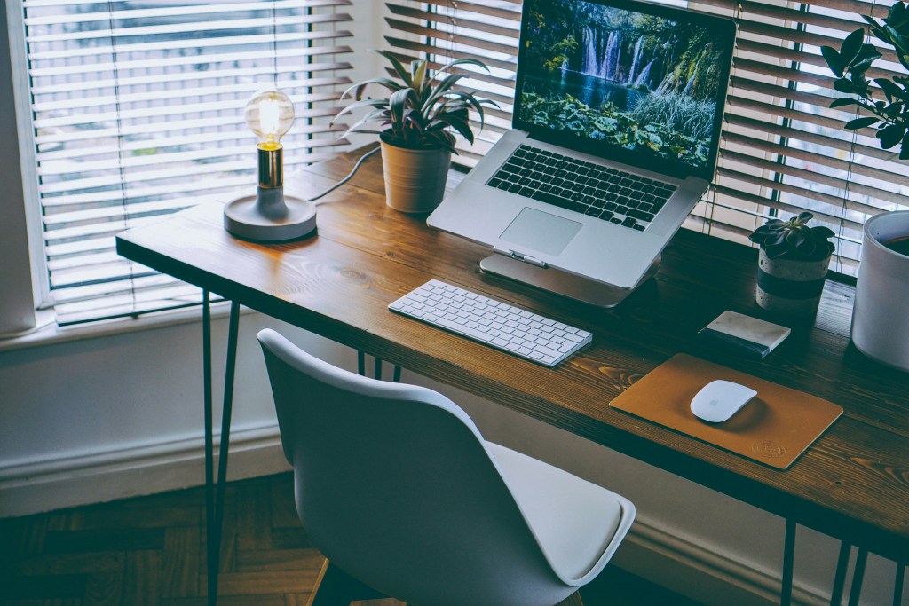 Modern wooden desk with tech set-up